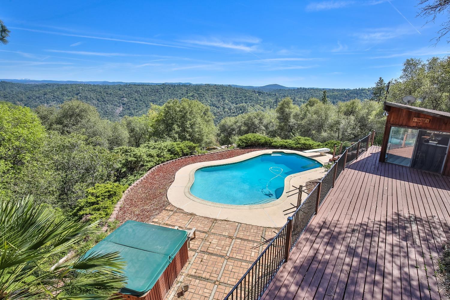 a view of a balcony with mountain view