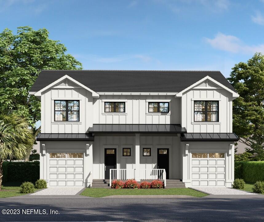 a front view of a house with a garage