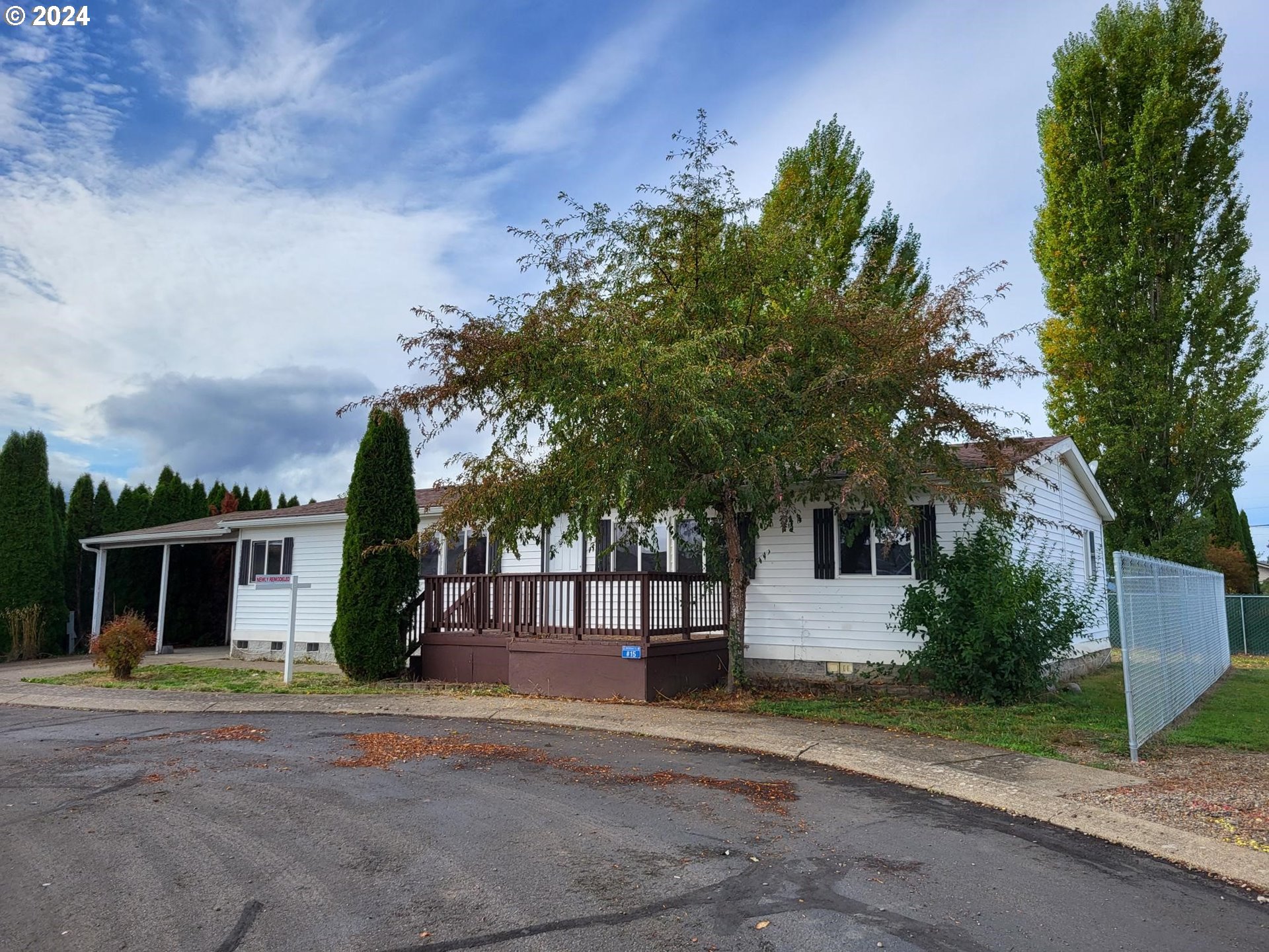 front view of a house with a garden