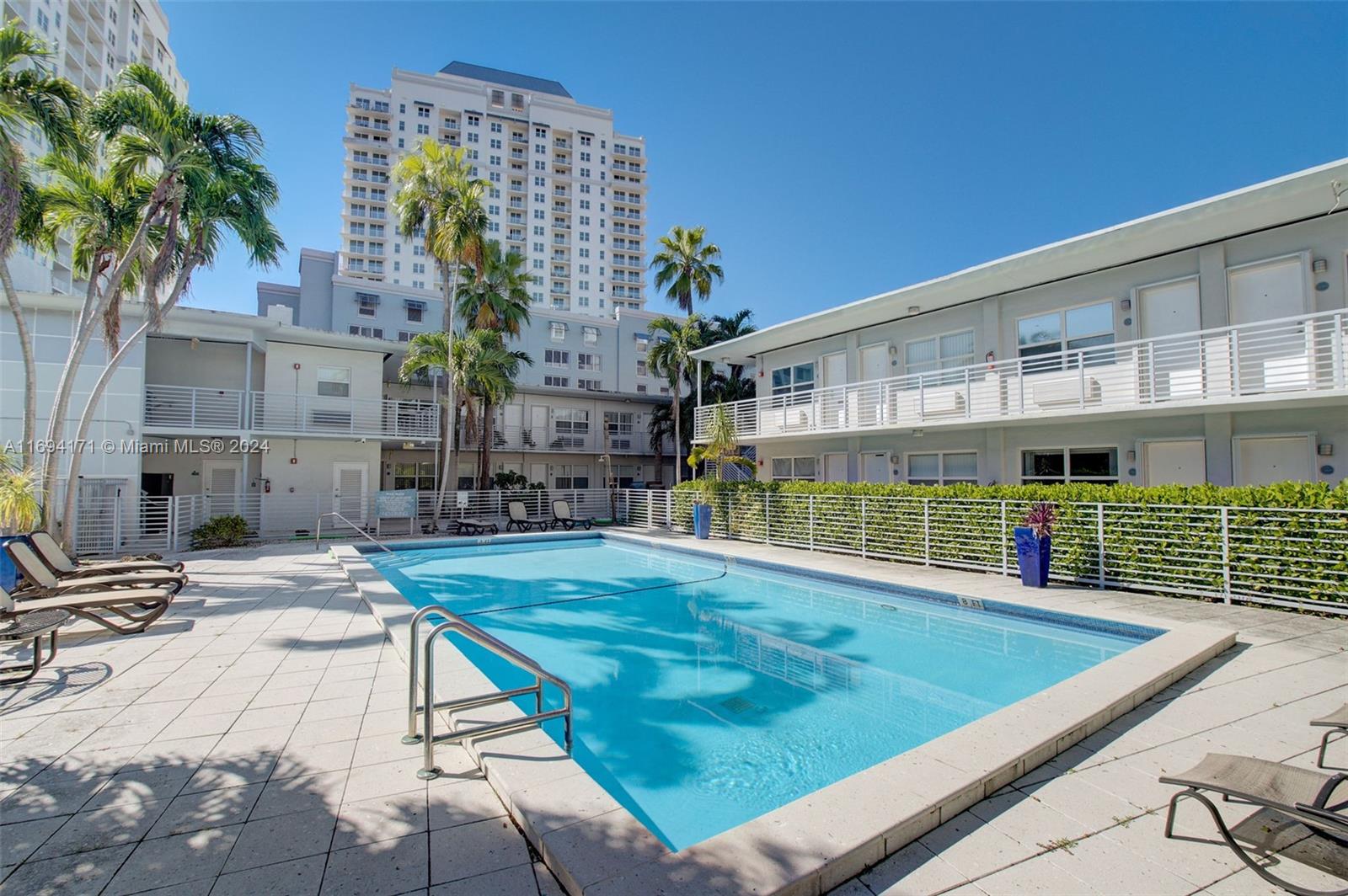 a view of a house with swimming pool