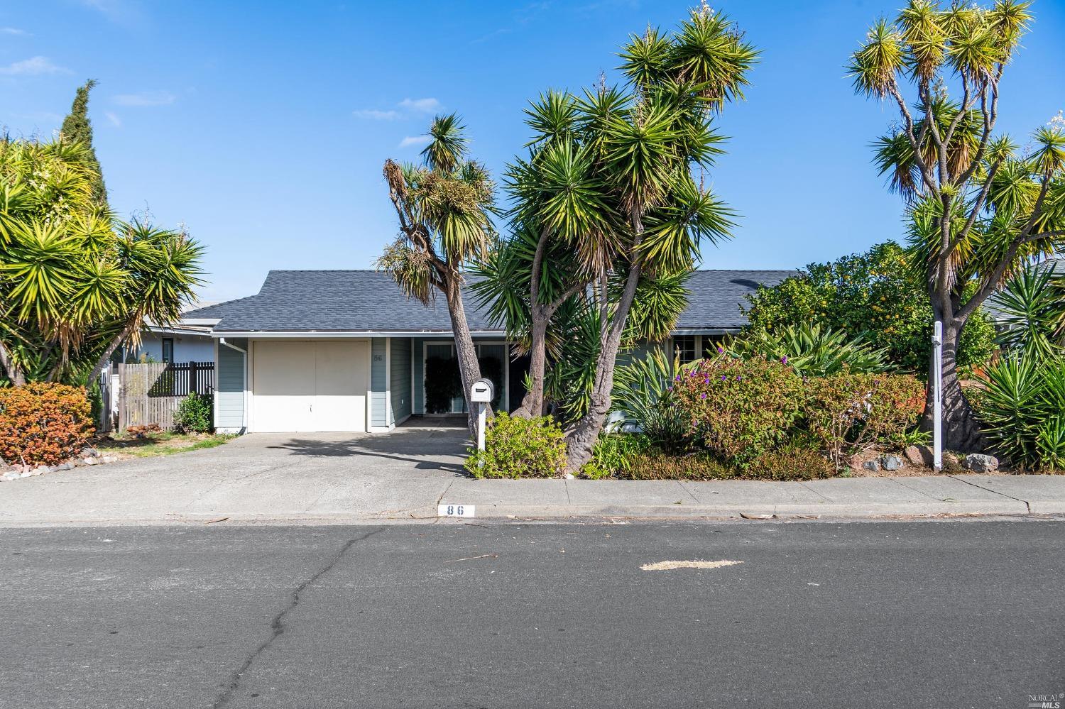 front view of a house with a street