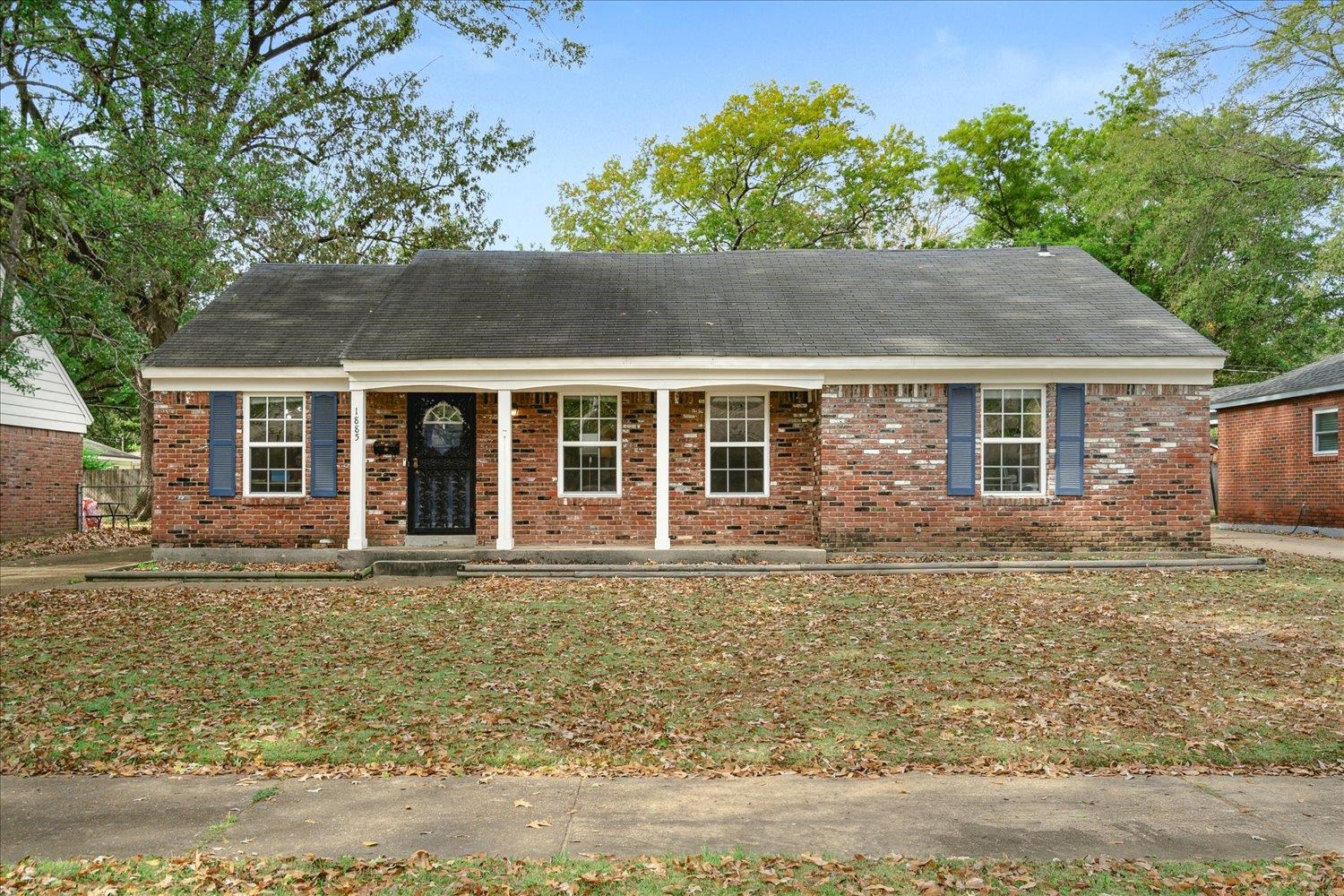 front view of house with a yard