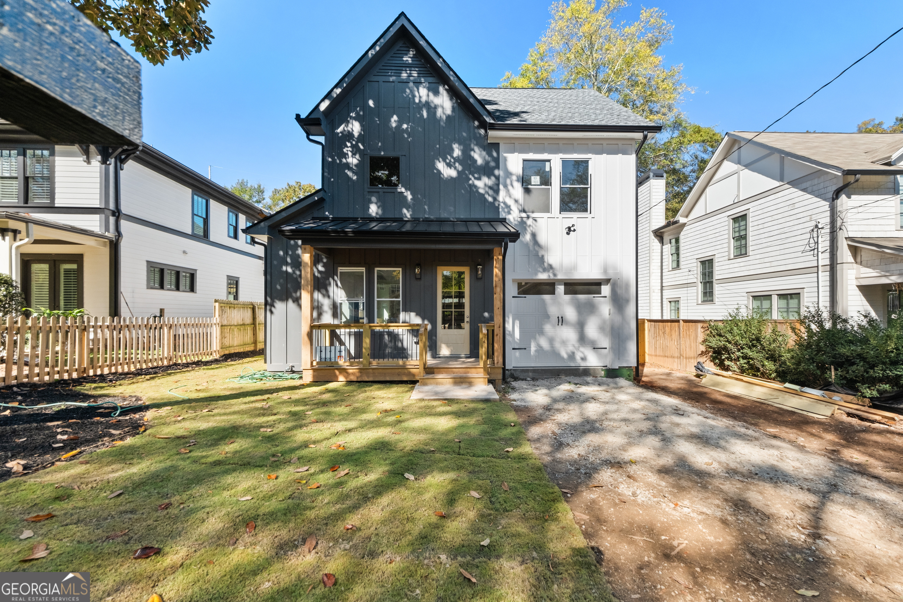 a front view of a house with a outdoor space