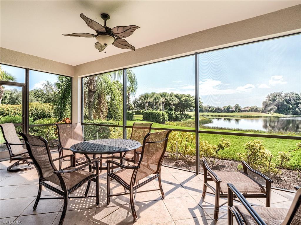 a view of a swimming pool with an outdoor seating space