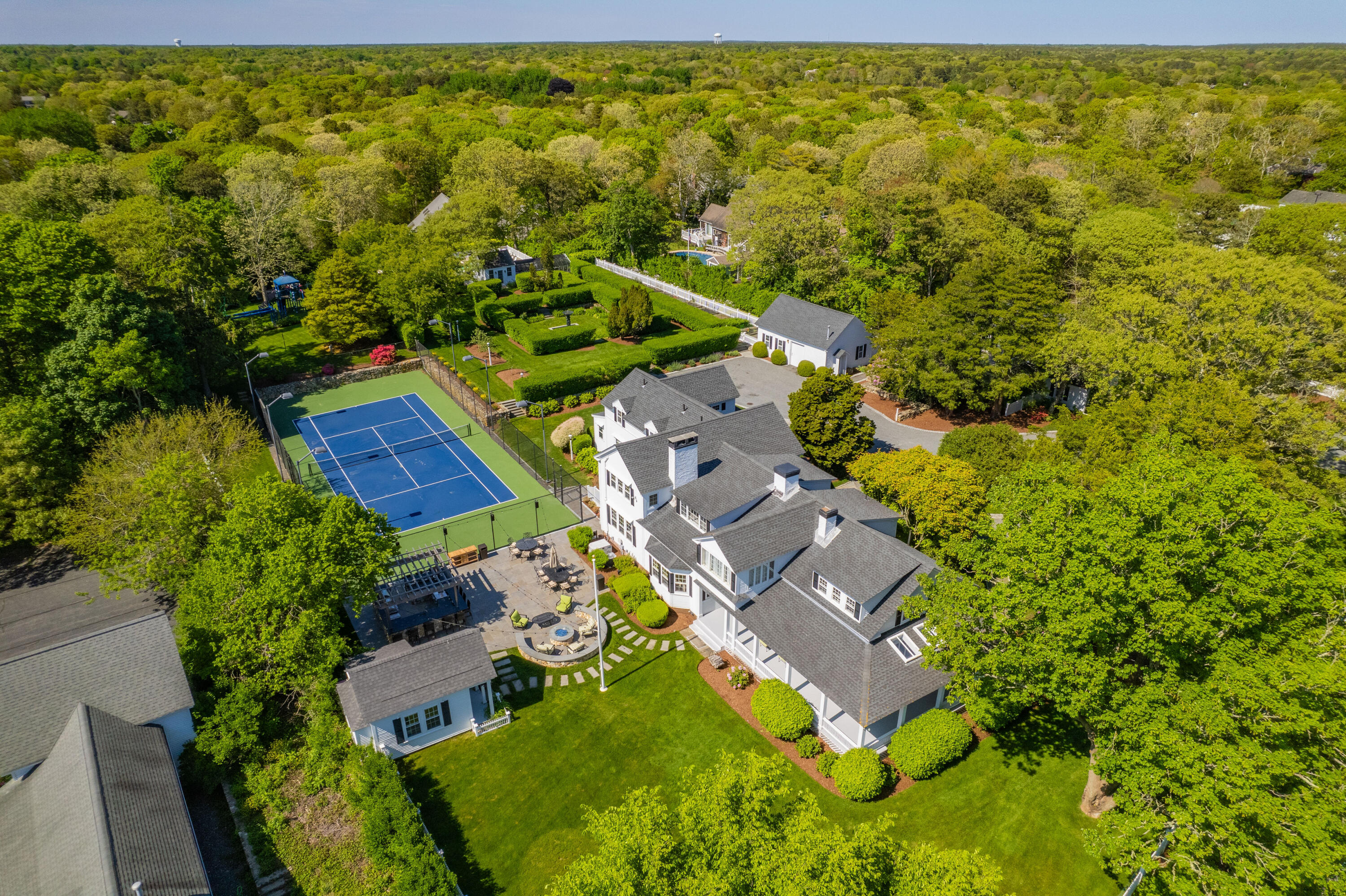 an aerial view of residential house with swimming pool and outdoor space