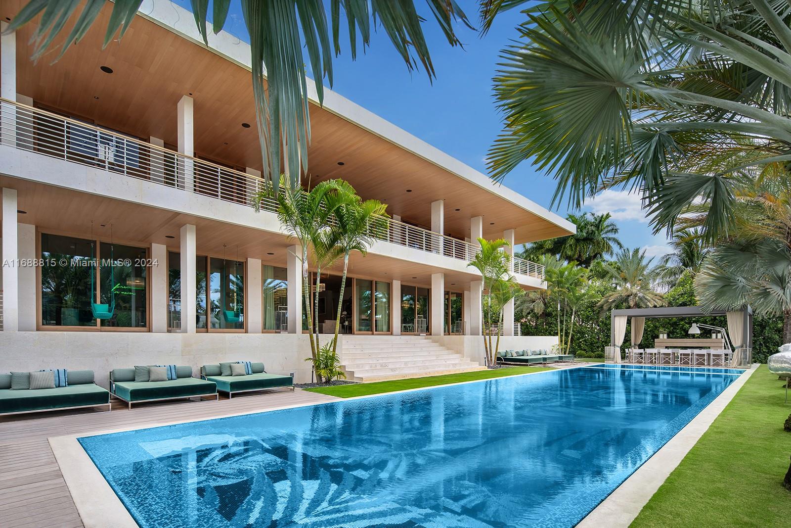 front view of a house with a swimming pool