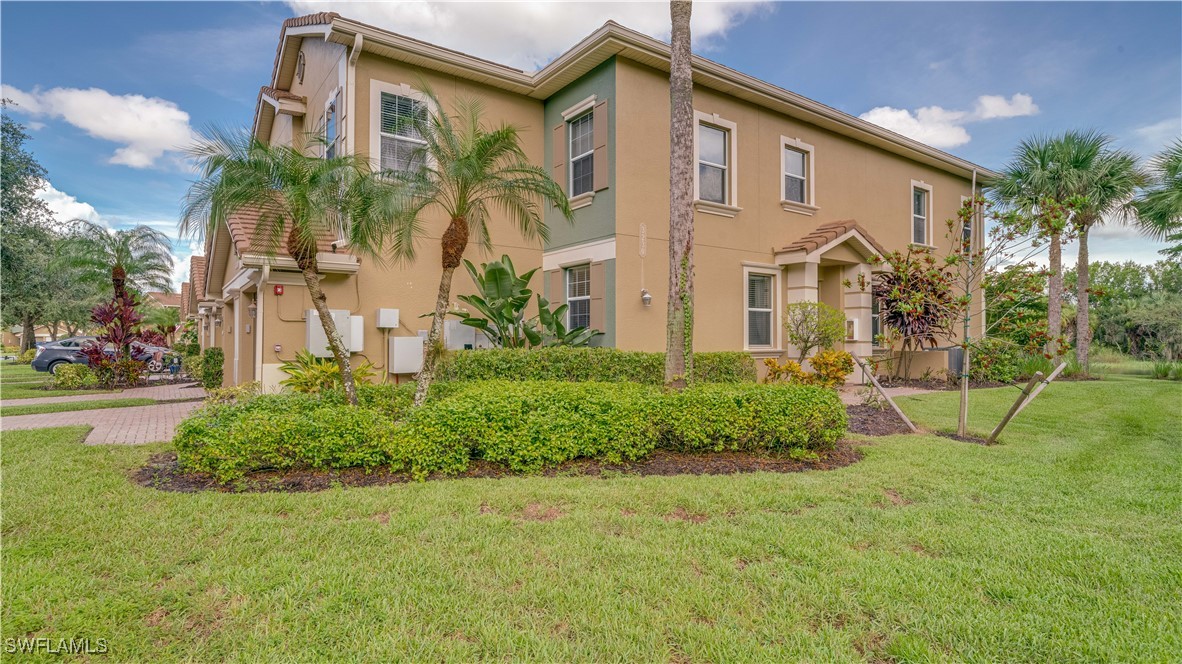 front view of a house with a big yard