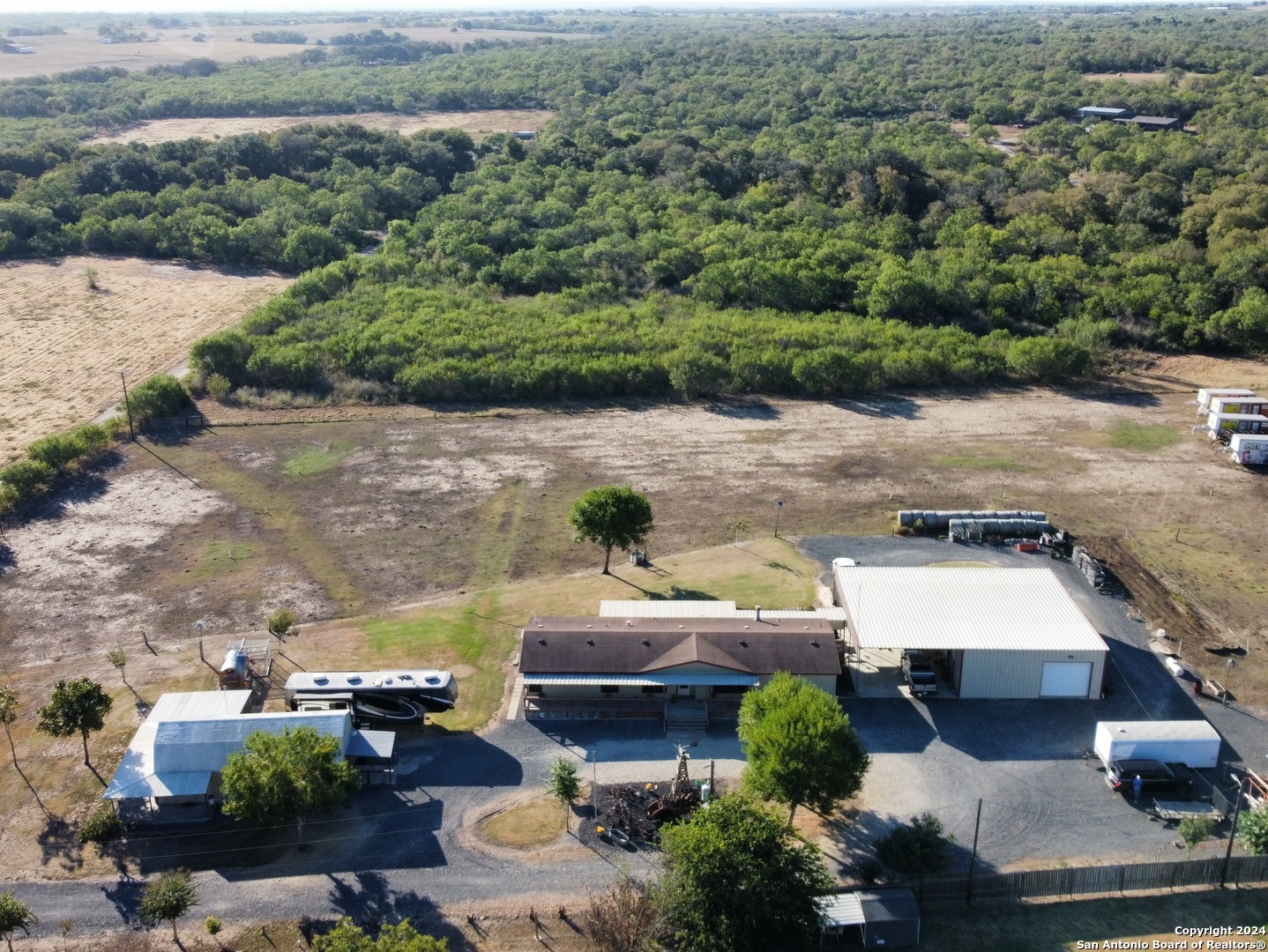 an aerial view of a house with a garden