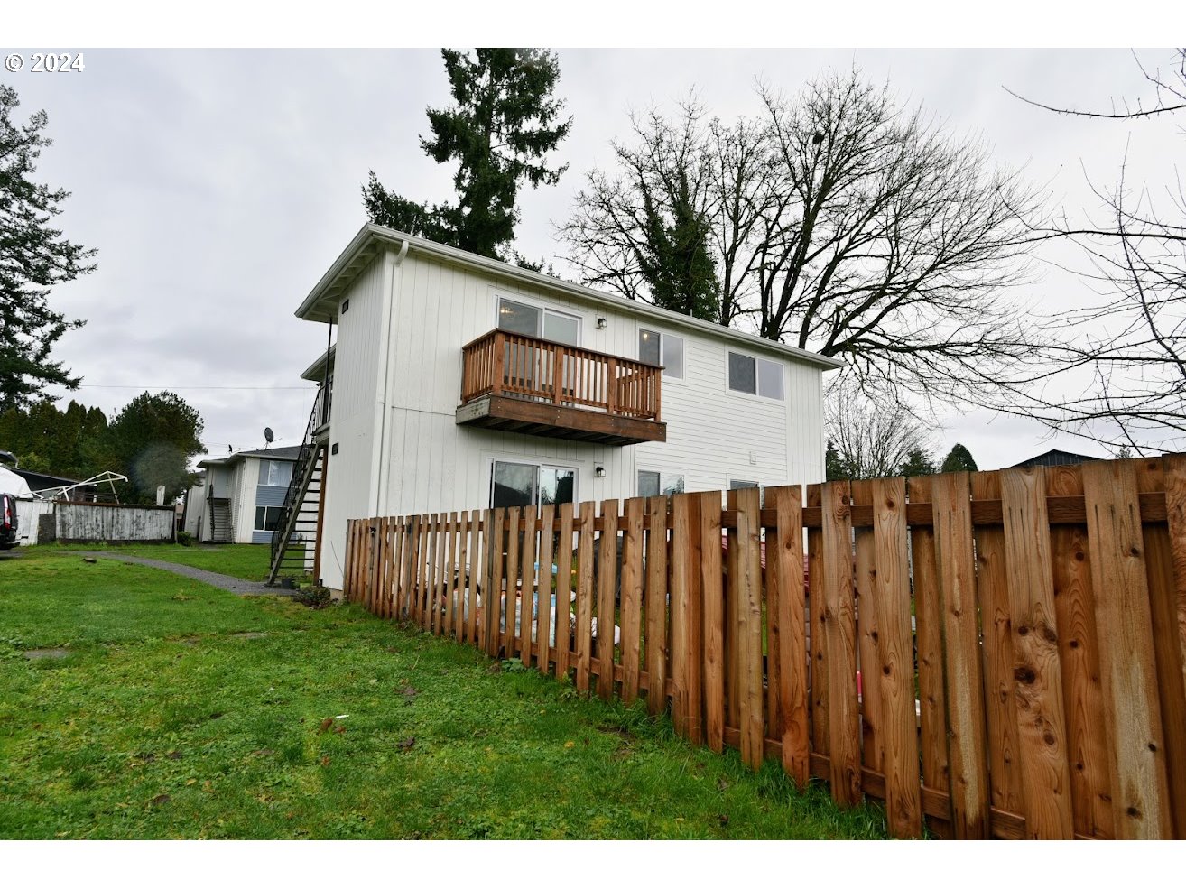 a house view with a garden space