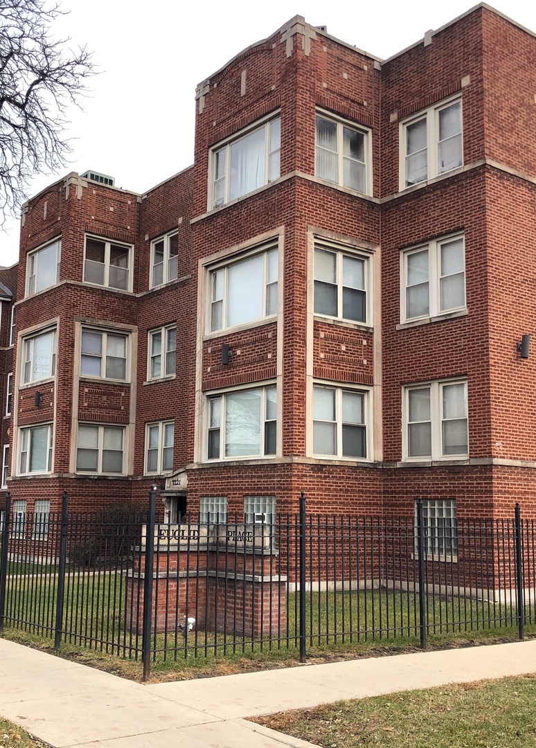 a front view of a brick building