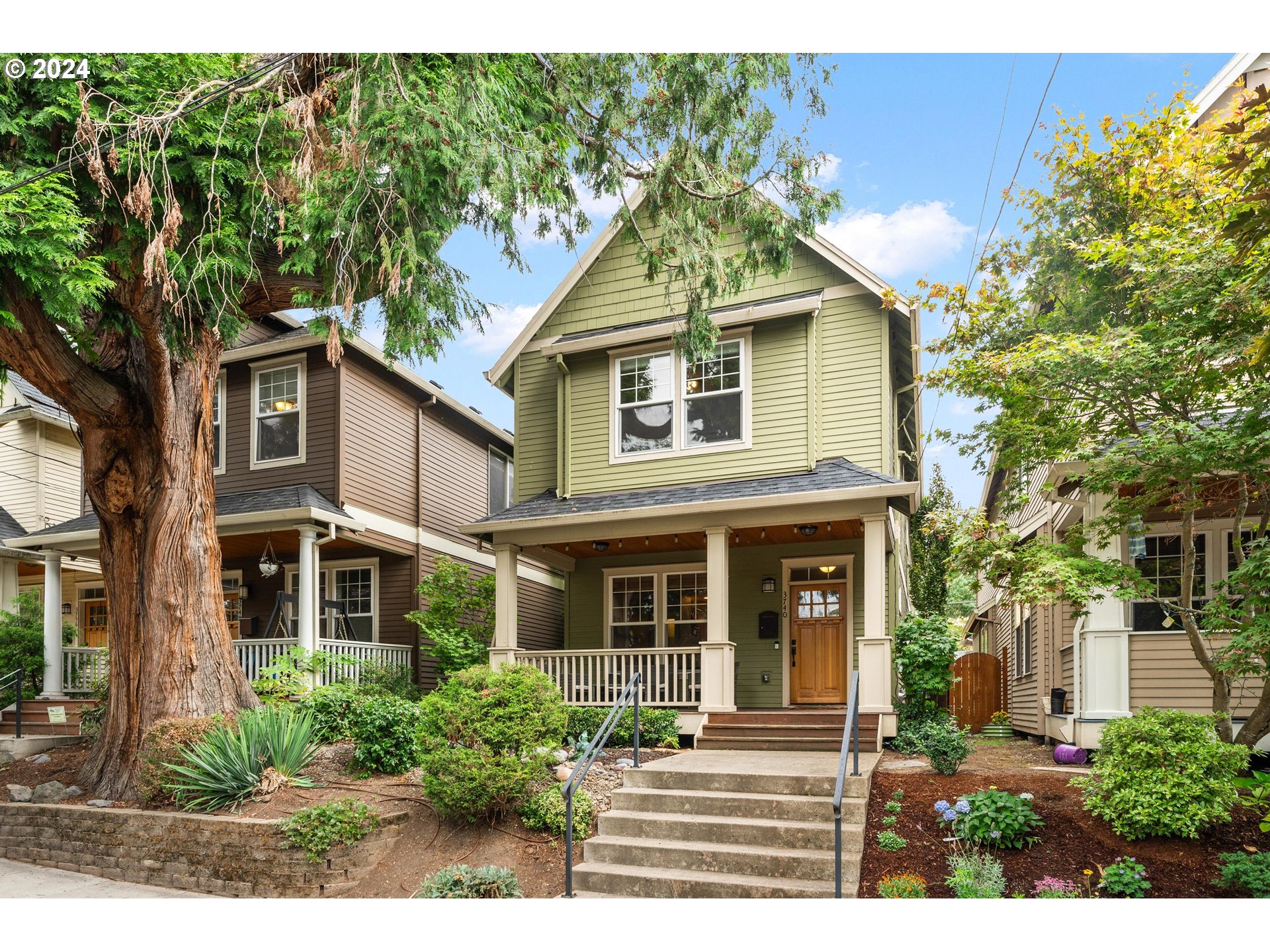 front view of a house with a yard