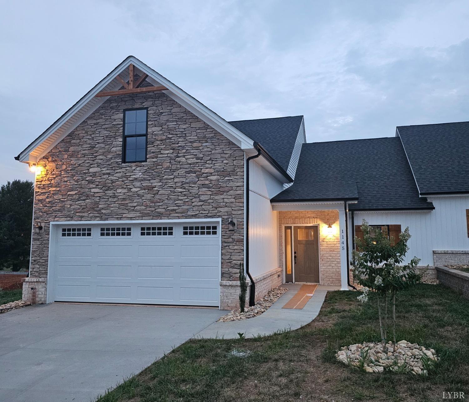 a front view of house with yard