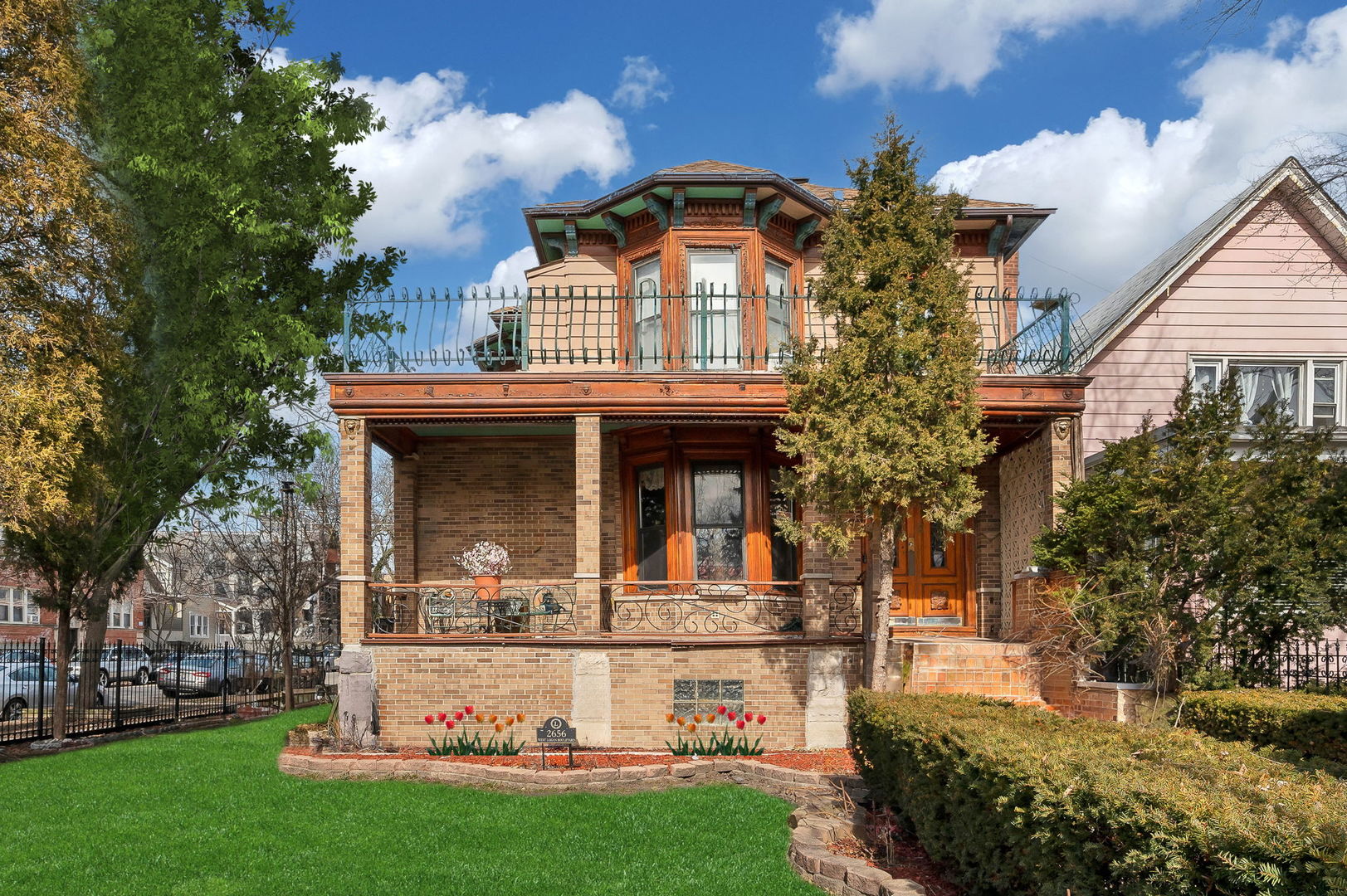 a front view of a house with garden