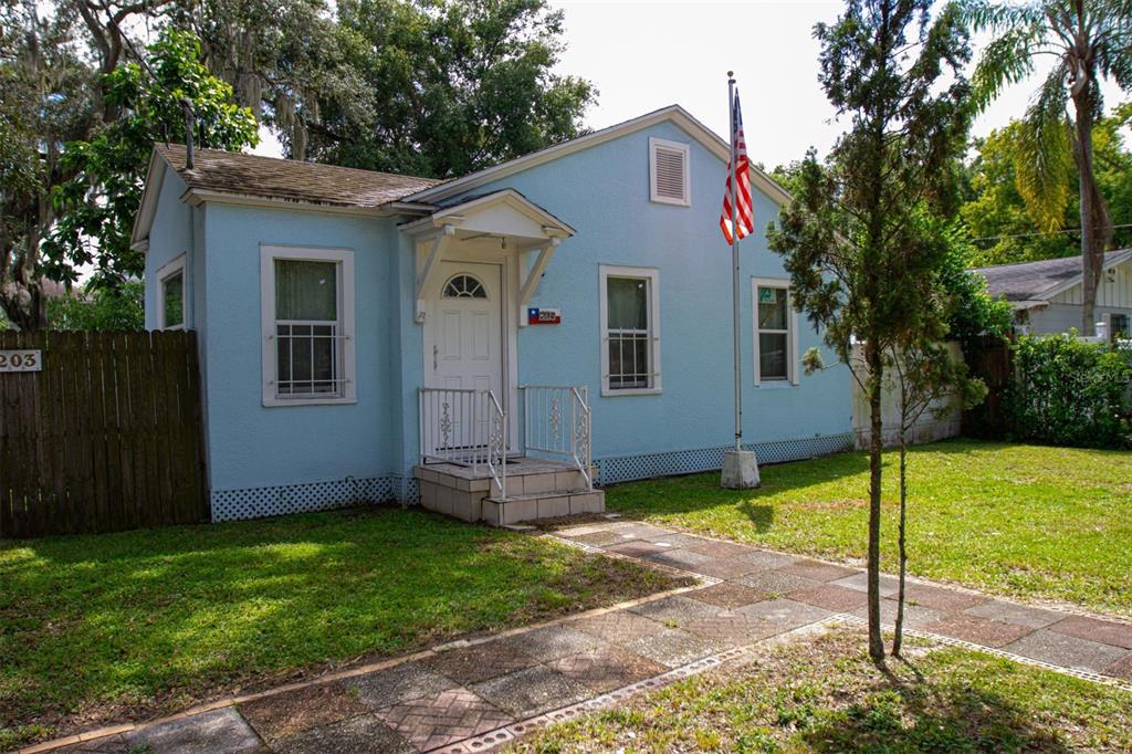 a front view of house with yard