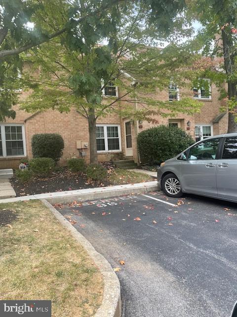 a car parked in front of a house