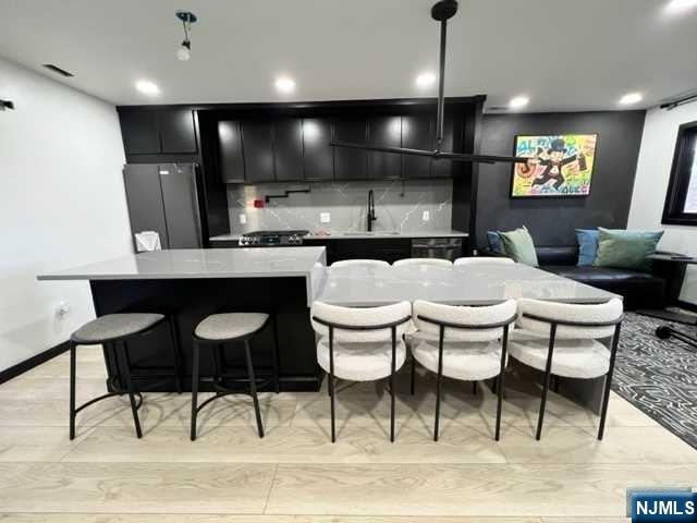 a kitchen with a table and chairs in it