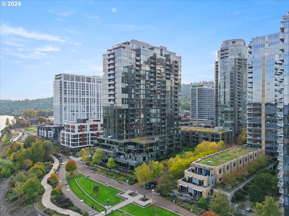 a view of a city with tall buildings