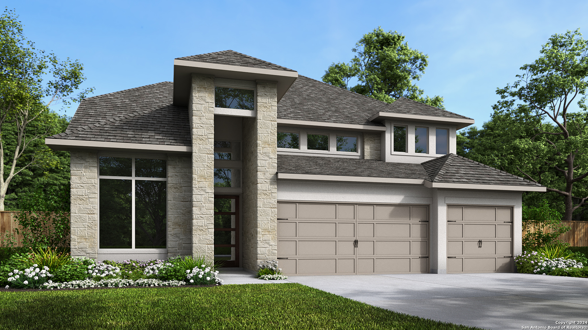 a front view of a house with a yard and garage