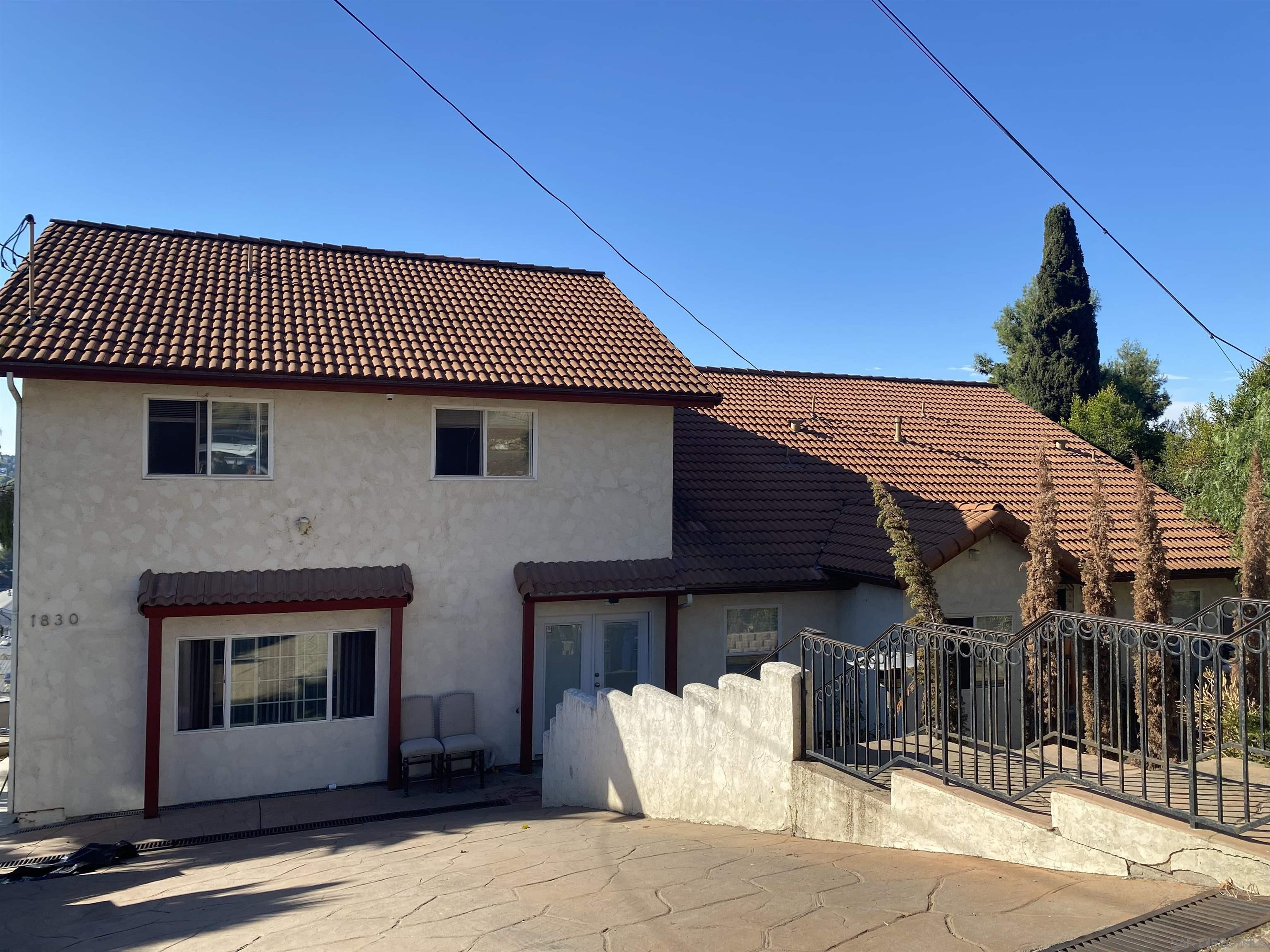 a front view of a house with a garage