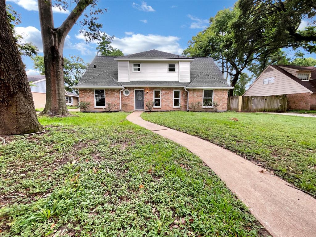 a house view with a garden space