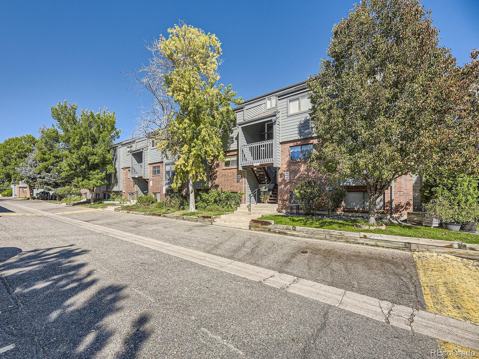 front view of a house with a street