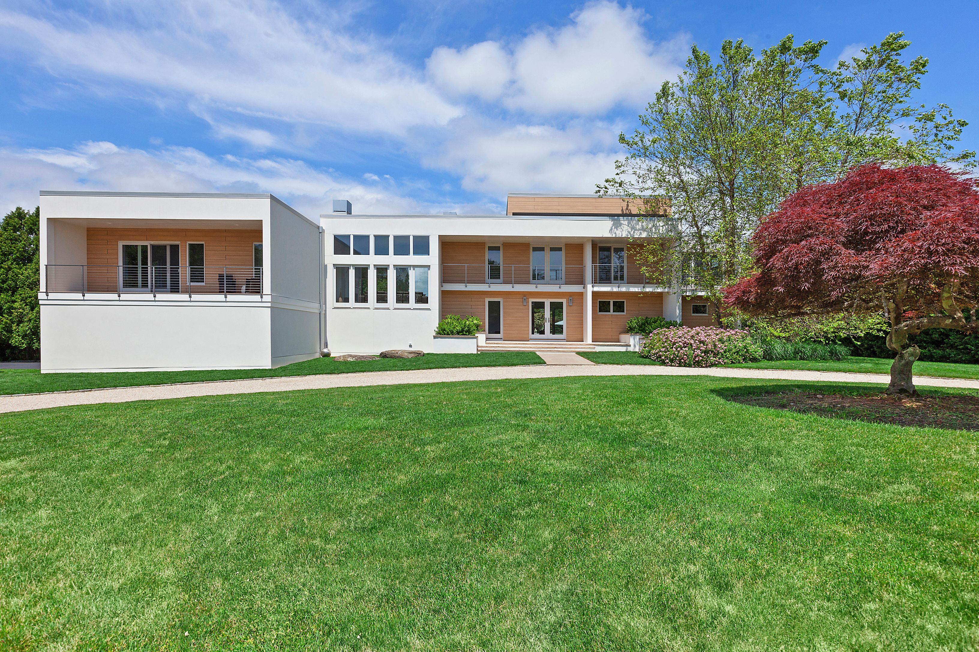 a house view with a garden space