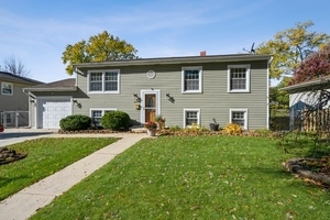 a front view of a house with a porch