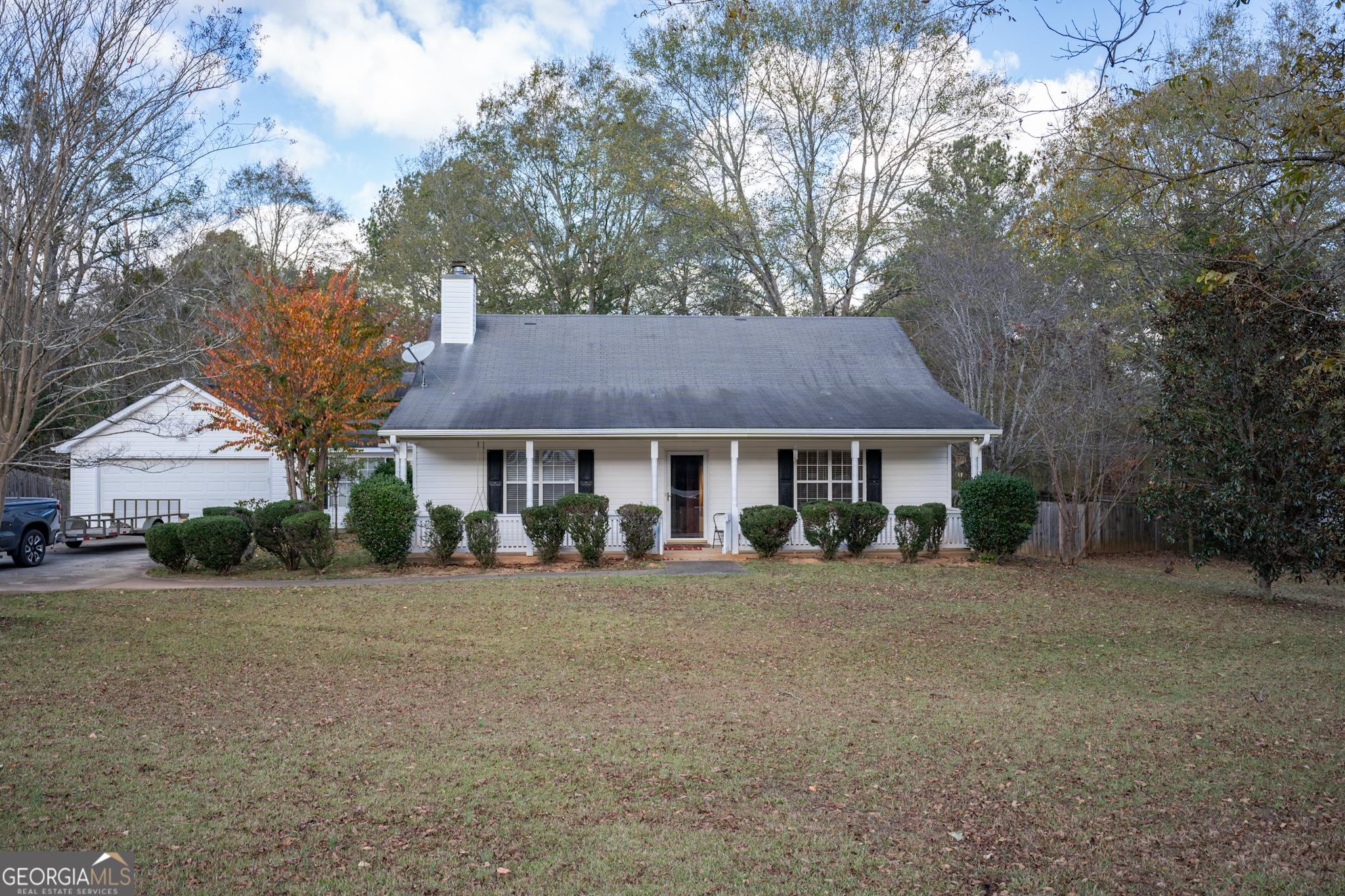 front view of a house with a yard