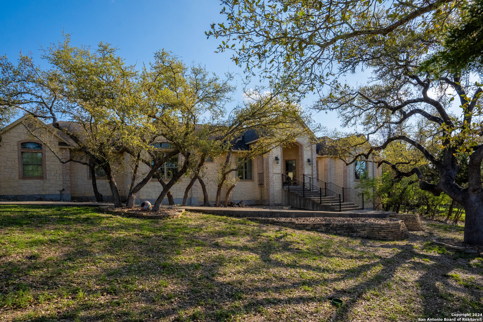 a view of house with yard