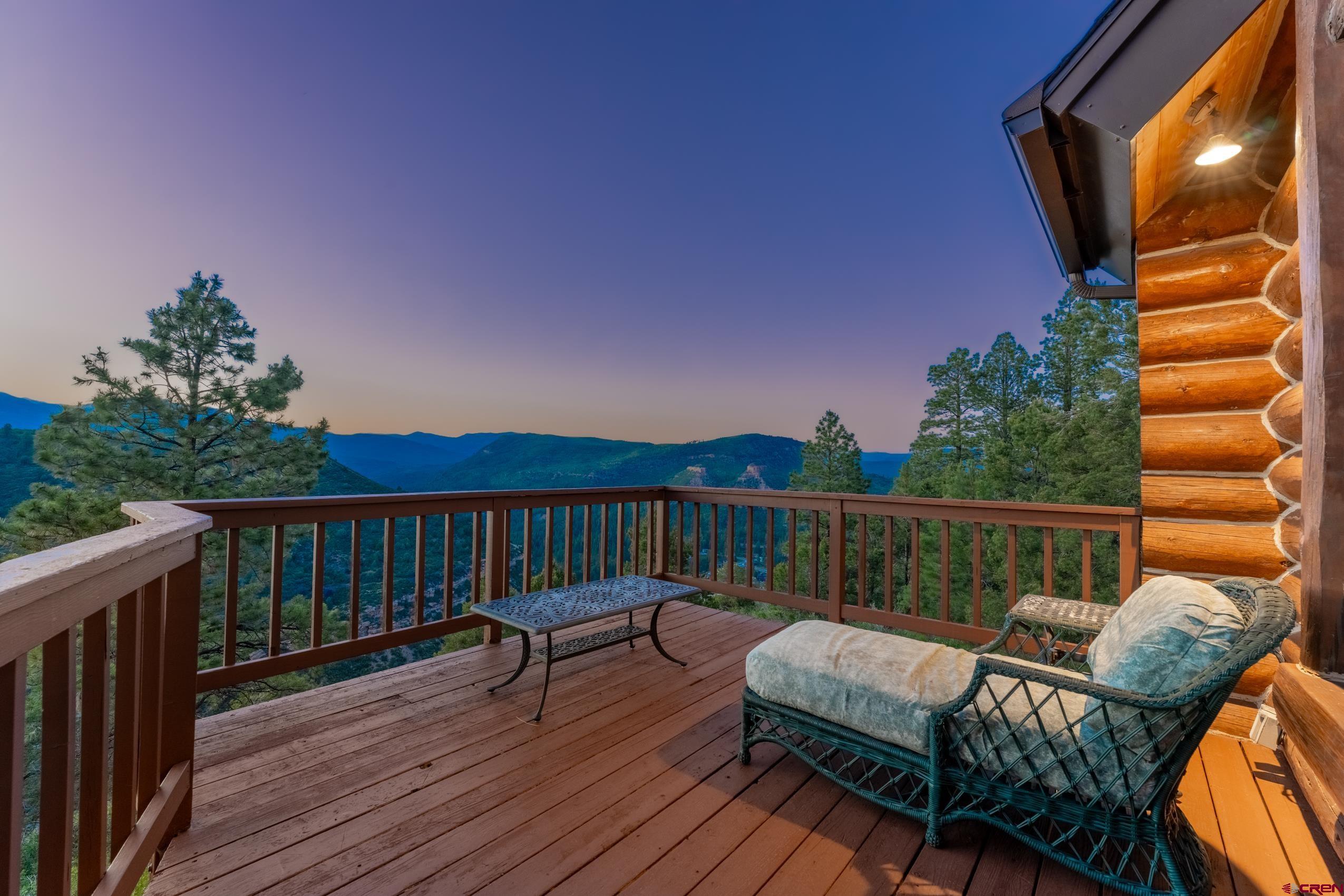 a view of balcony with furniture