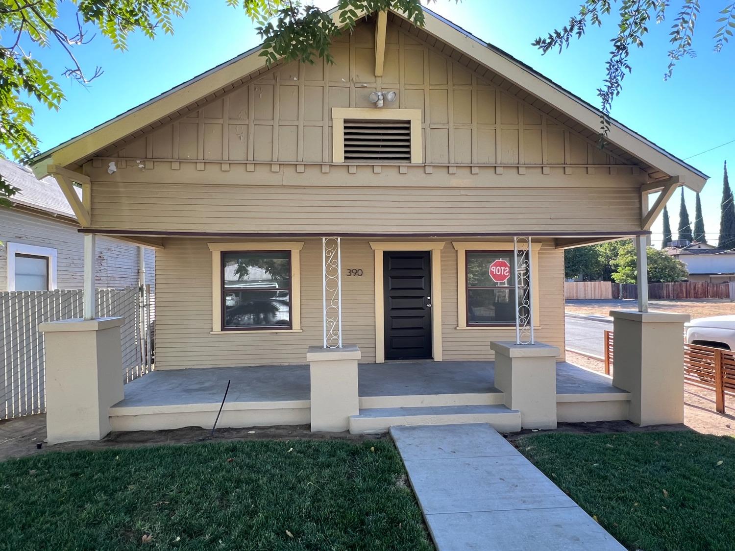 a front view of house with yard