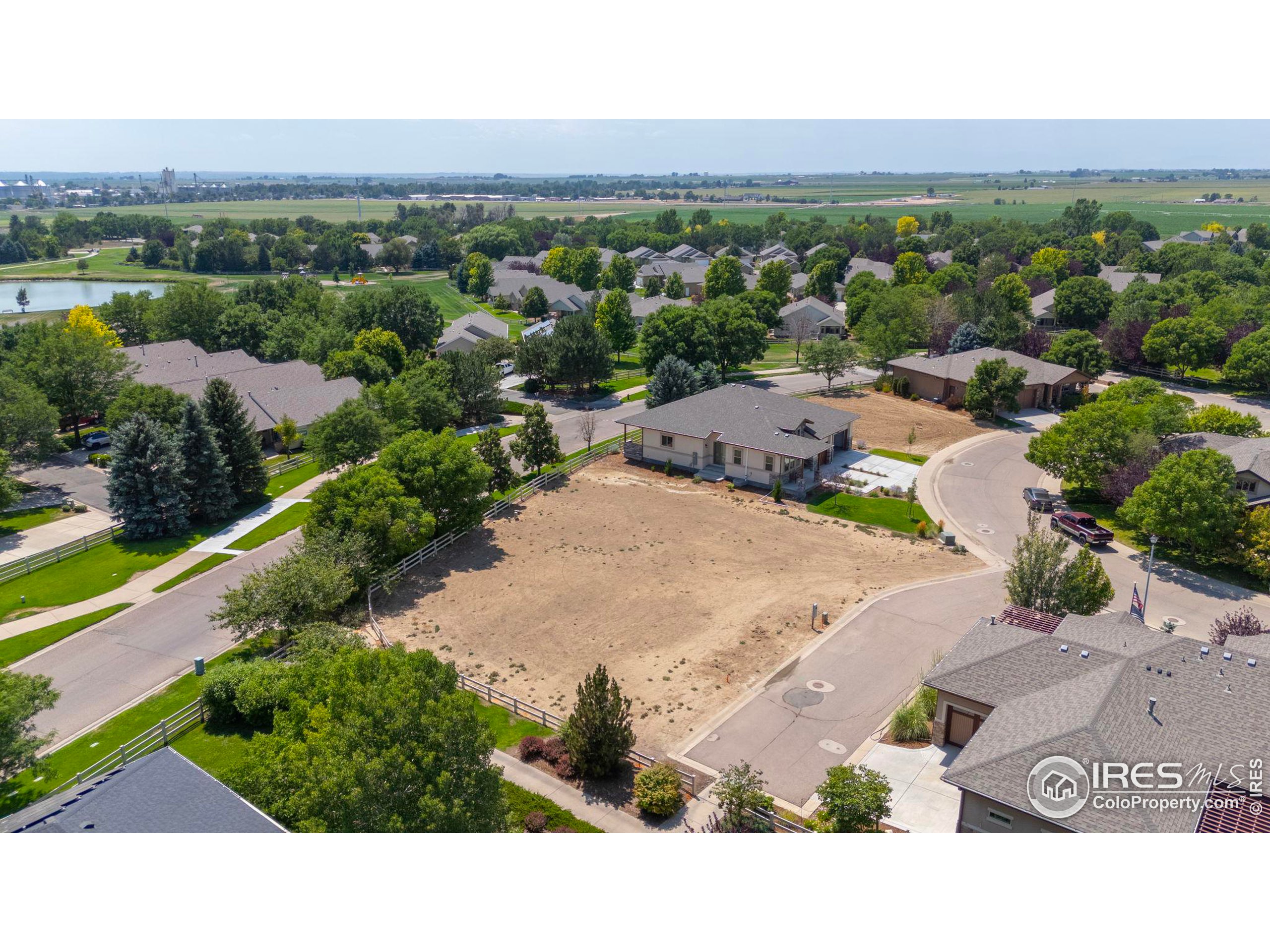 an aerial view of a house with a outdoor space