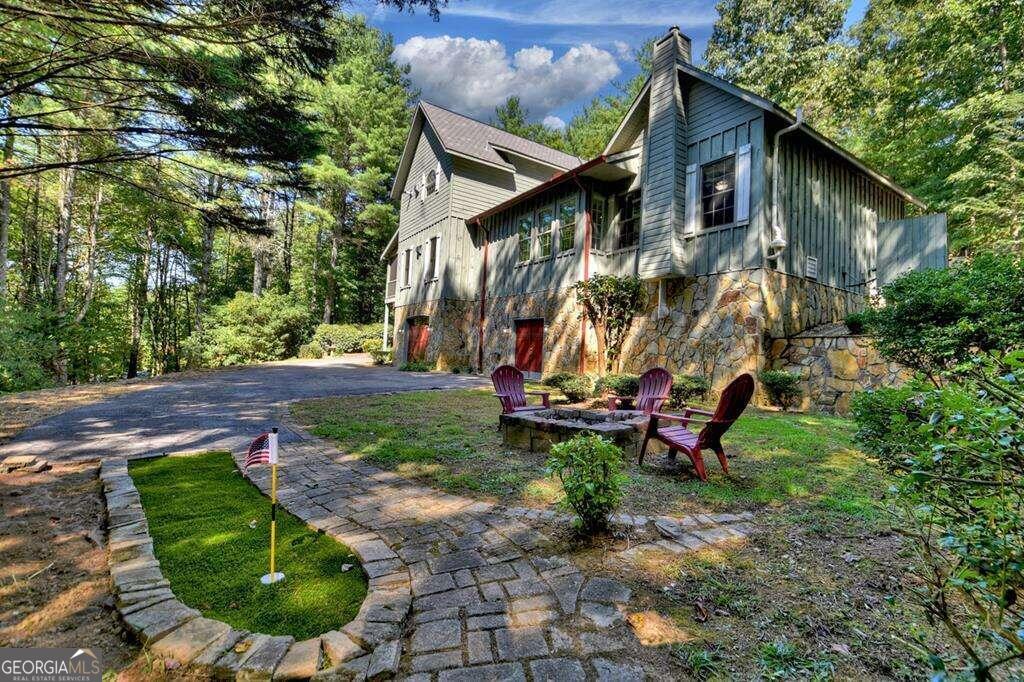 front view of a house with a yard