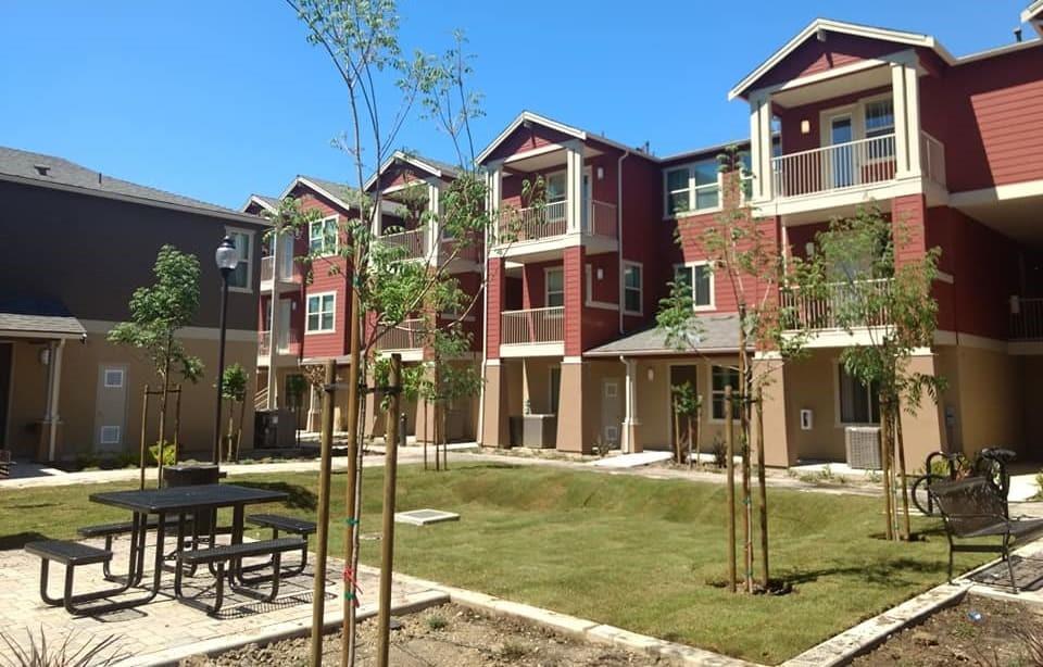 a front view of a building with swimming pool