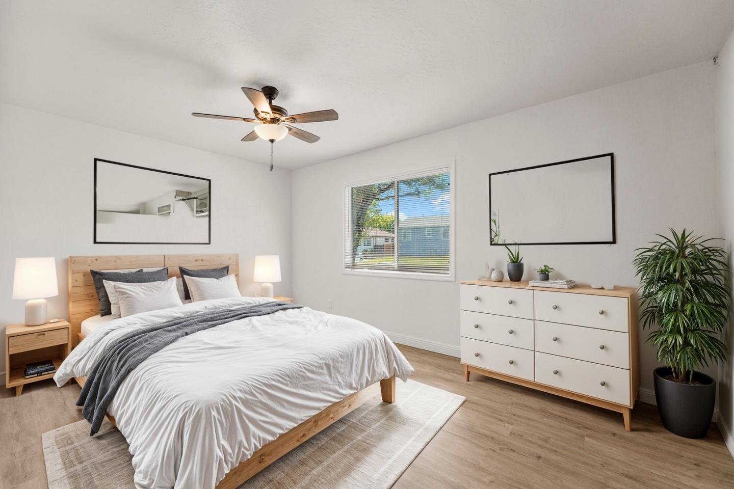 a bedroom with a bed and a dresser