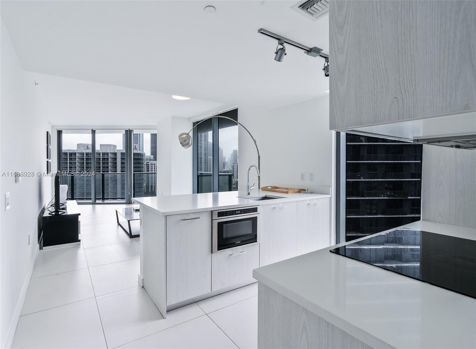 a kitchen with a stove and a refrigerator