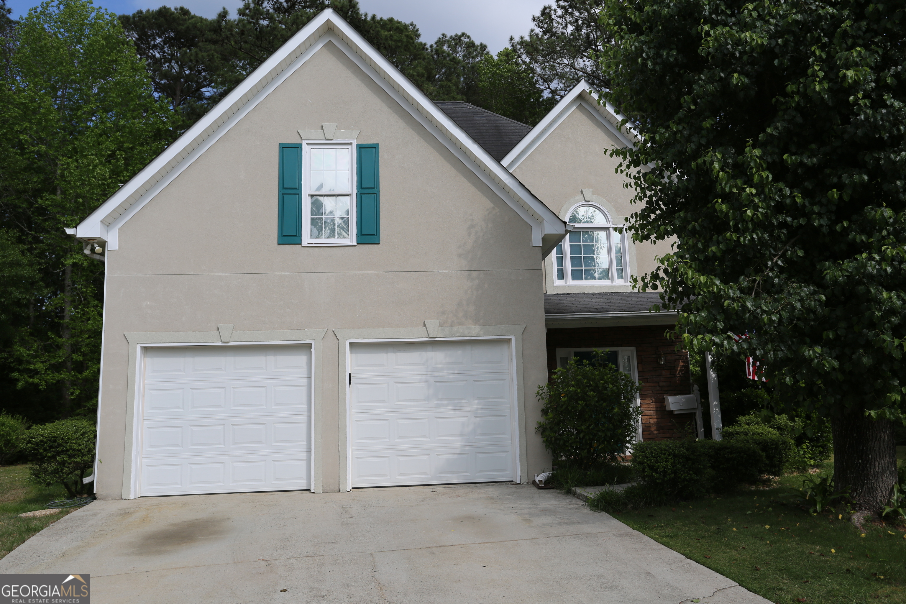 a view of house with outdoor space area