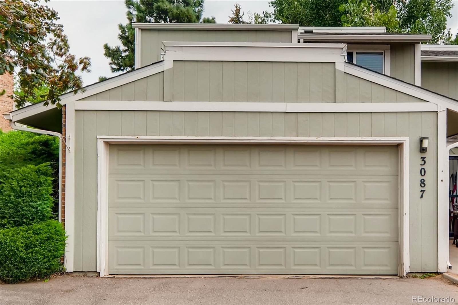 a view of a house with garage