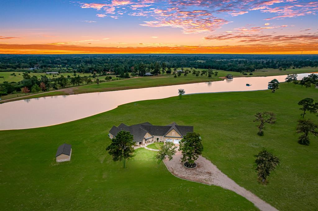 a view of a golf course with a lake