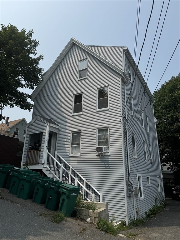 a front view of a house with garage