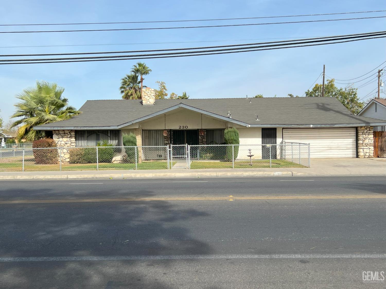 a front view of a house with a garage