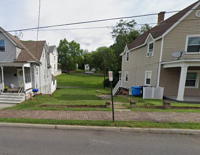 a view of a house with a park