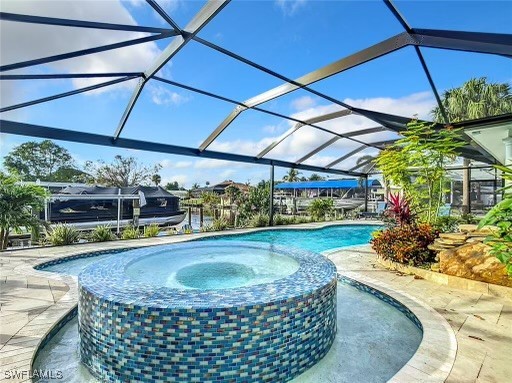 a view of a swimming pool with a patio