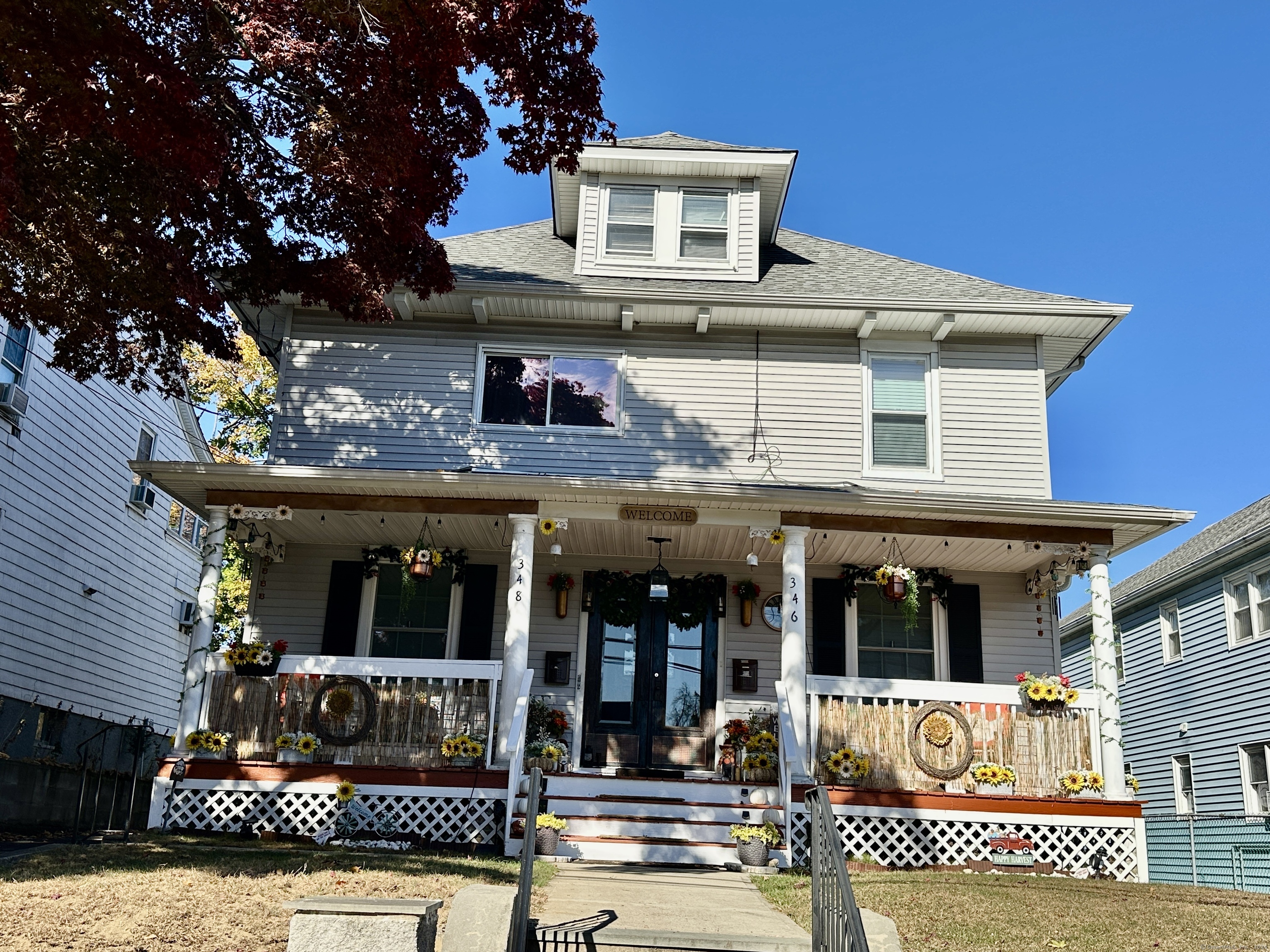 a front view of a house with a porch