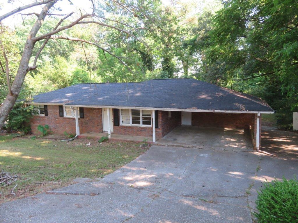 front view of a house with a yard