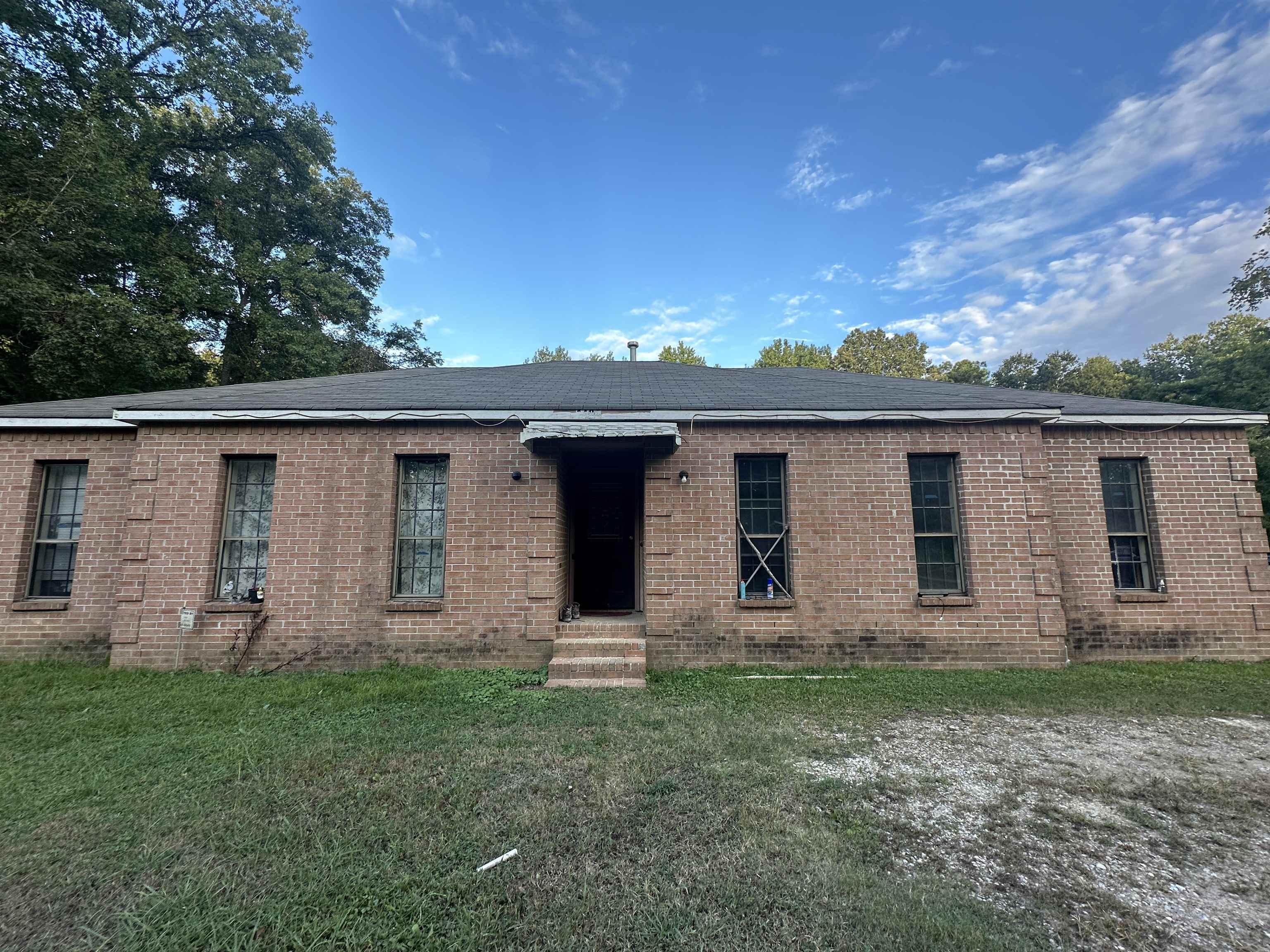 front view of house with a yard