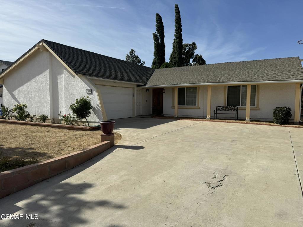 a view of a house with a patio