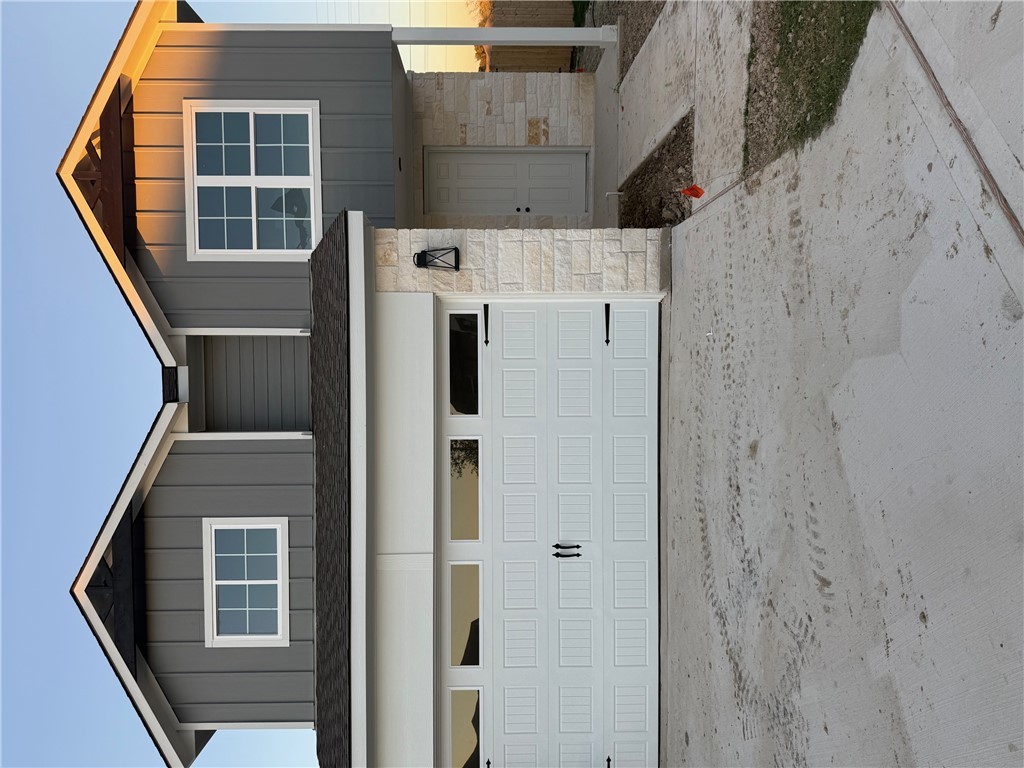 View of front facade with a garage