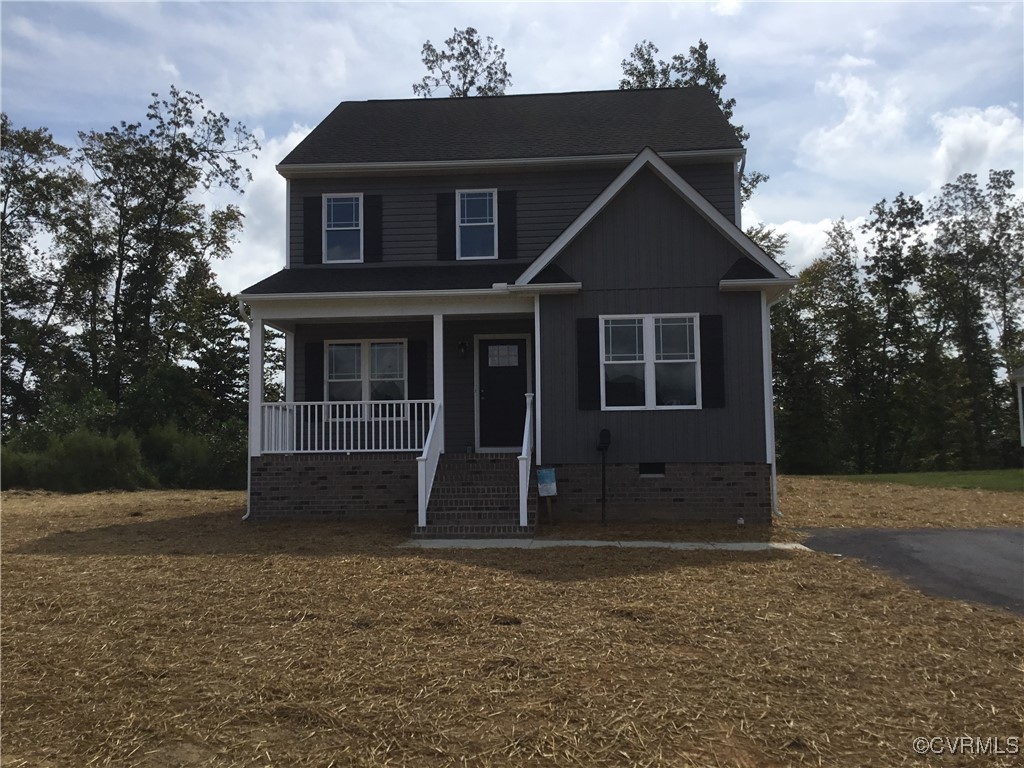 front view of house with a yard