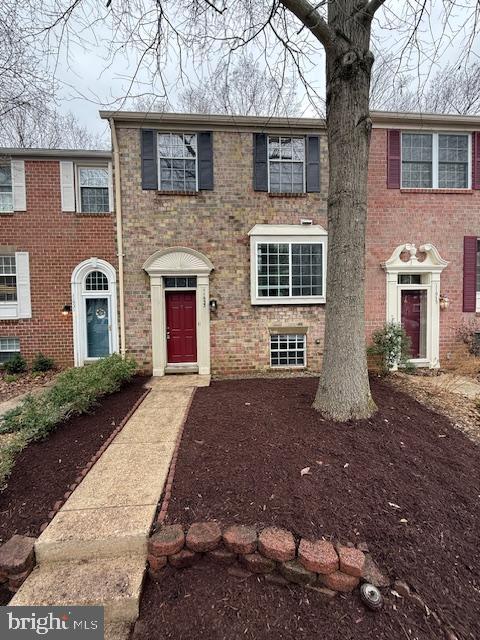 a front view of a house with yard